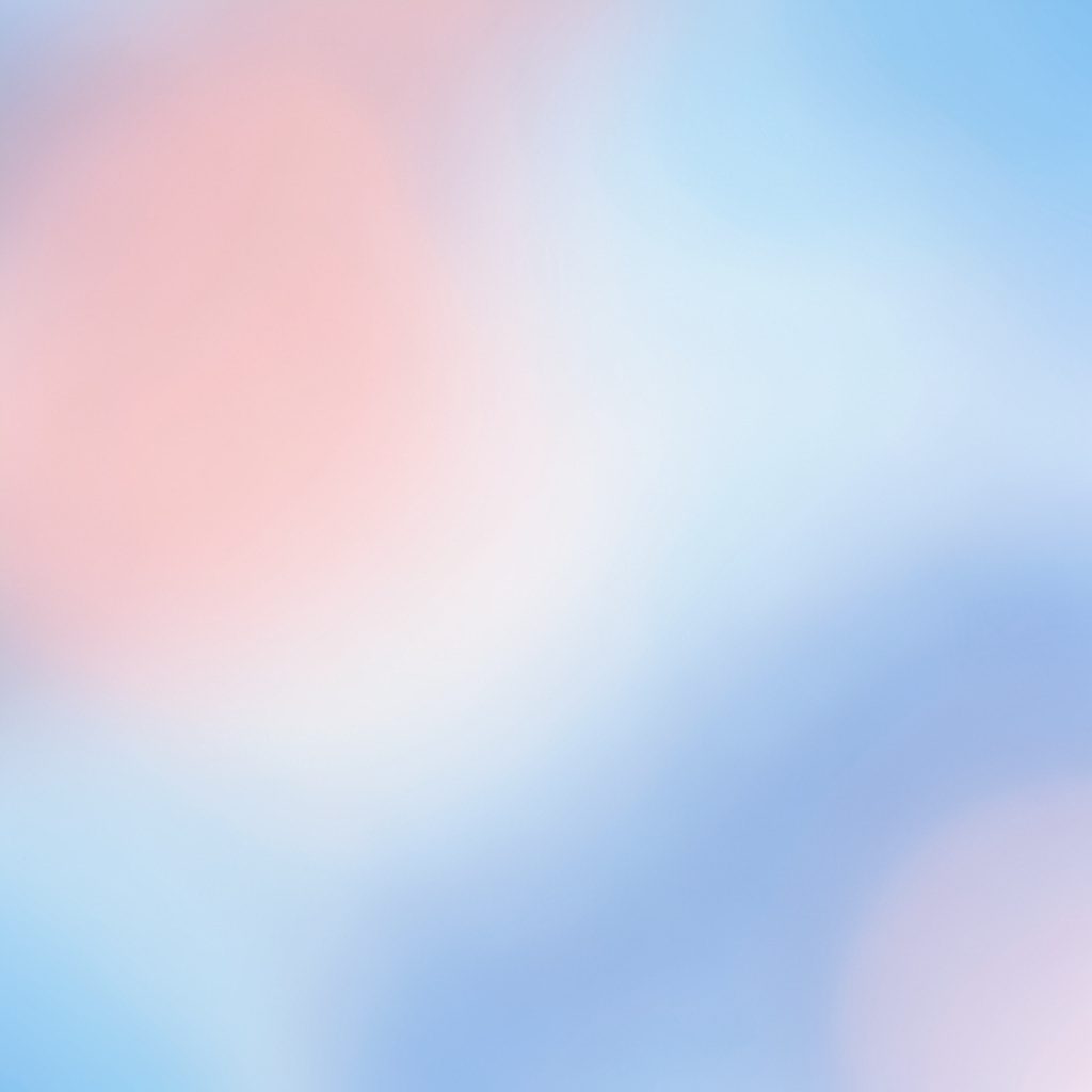 Abstract gradient of pale blue, soft pink, and warm yellow in a smooth horizontal wash